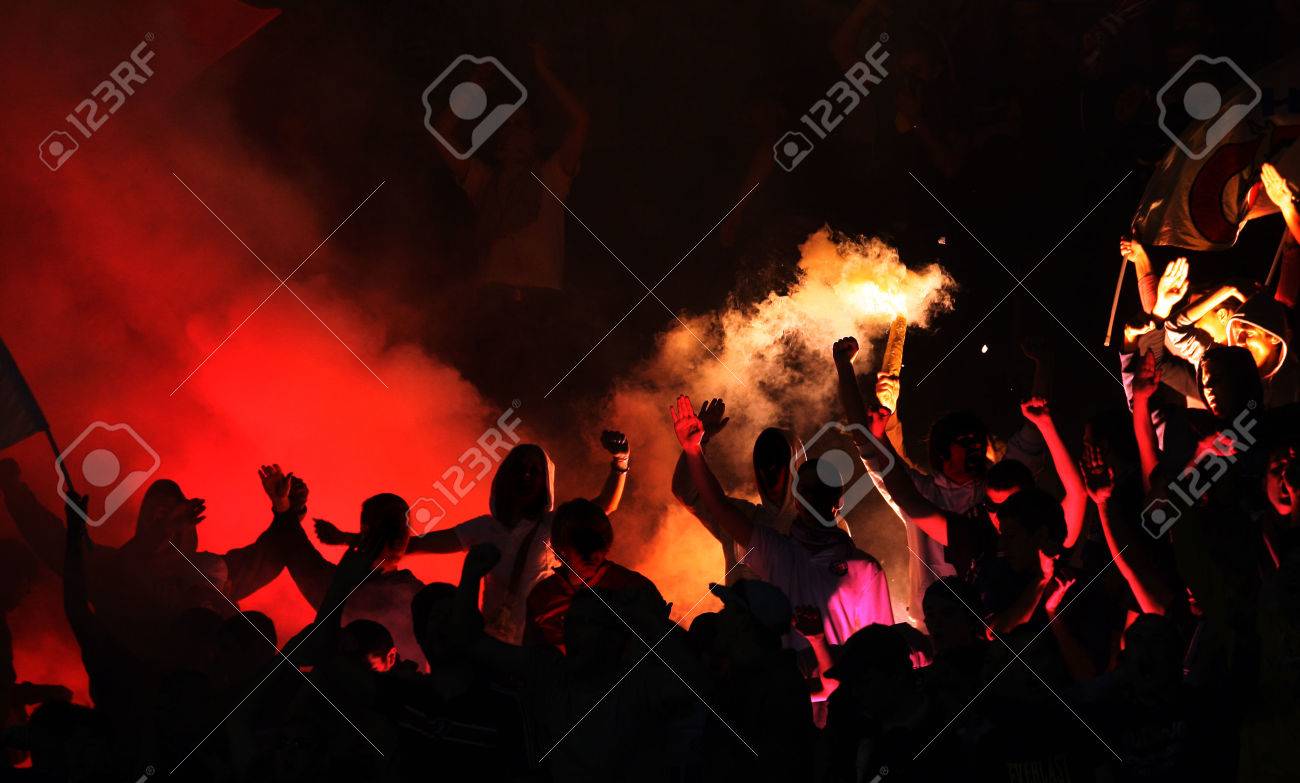 football hooligans with torches