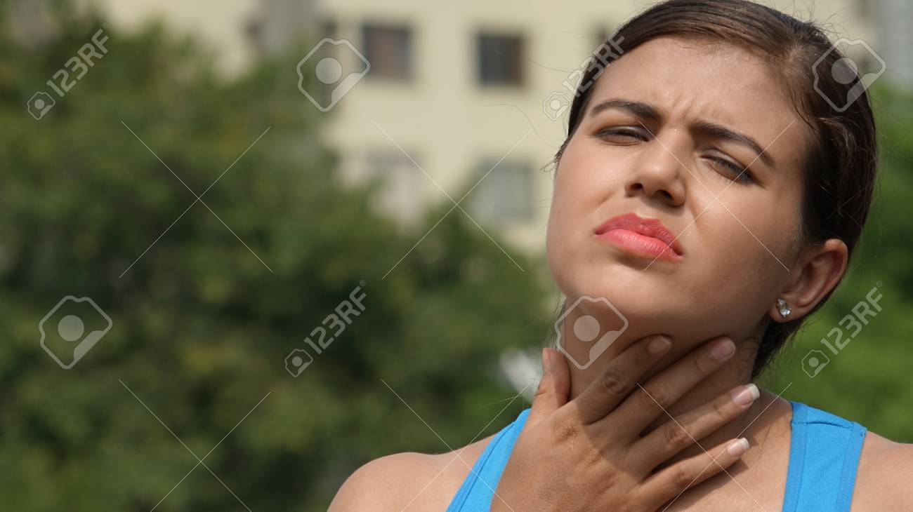 Latina Youngster With Sore Throat Stock Photo, Picture and Royalty Free  Image. Image 92246554.