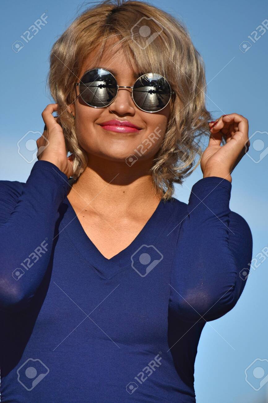 Female With Short Hair Wearing Sunglasses Stock Photo Picture And