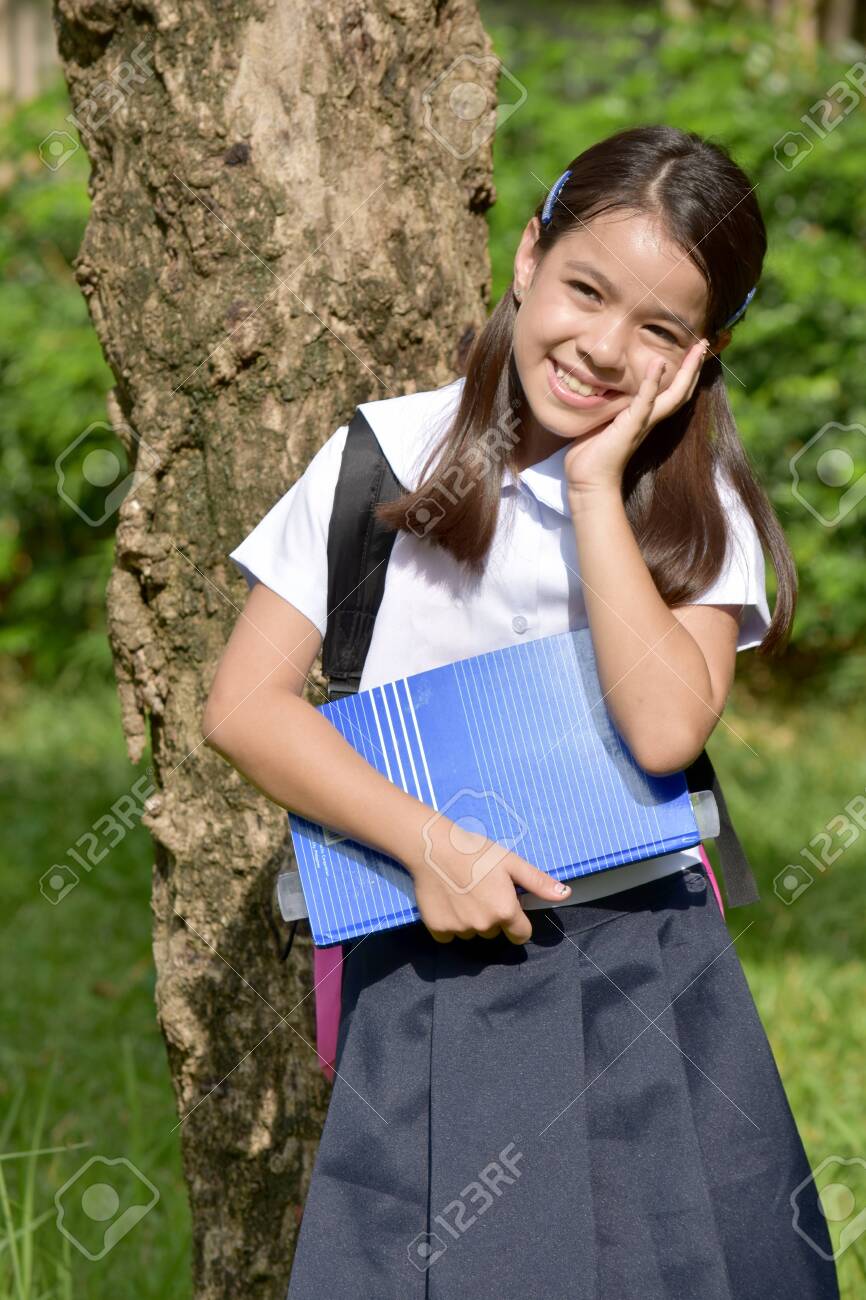 filipina school girls Filipina School Girl Wondering With Books Stock Photo, Picture and Royalty  Free Image. Image 119394472.