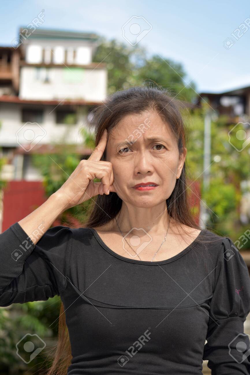 Senior Asian Granny Making A Decision Stock Photo, Picture and Royalty Free  Image. Image 129784015.