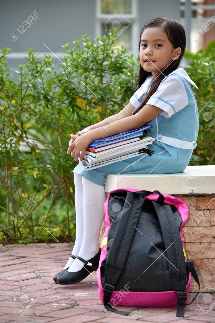 filipina school girls Serious Filipina School Girl Wearing School Uniform Stock Photo, Picture  and Royalty Free Image. Image 135631196.