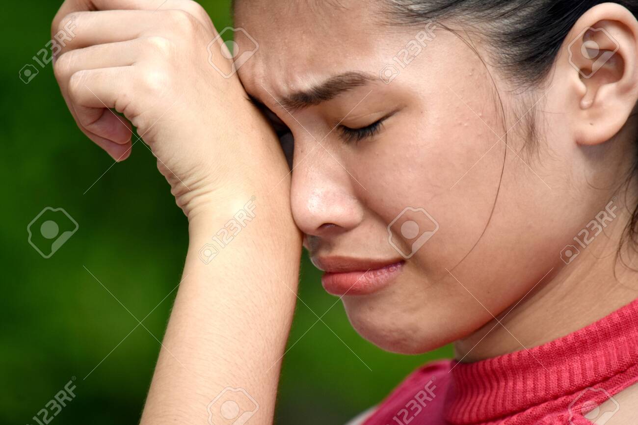 A Tearful Cute Asian Teen Girl Stock Photo Picture And Royalty Free Image Image