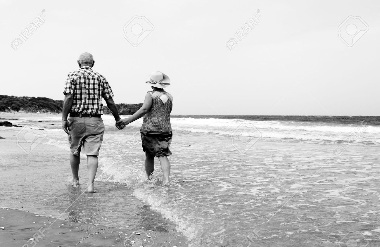 Older Couple On Beach Older Couple On Beach