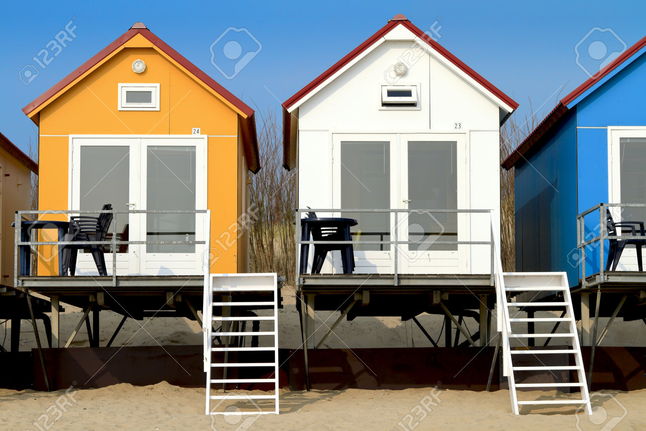 White Beach House yellow blue and white beach houses in vlissingen stock photo White Beach House yellow blue and white beach houses in vlissingen stock photo