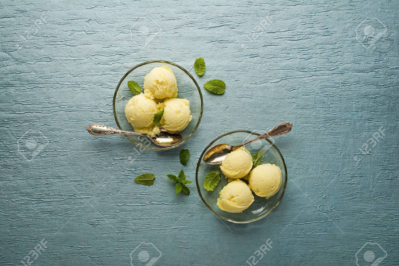 Fresh fruit sorbet ice cream in a glass plate - overhead shots. - 42149682 Fresh fruit sorbet ice cream in a glass plate - overhead shots. - 42149682