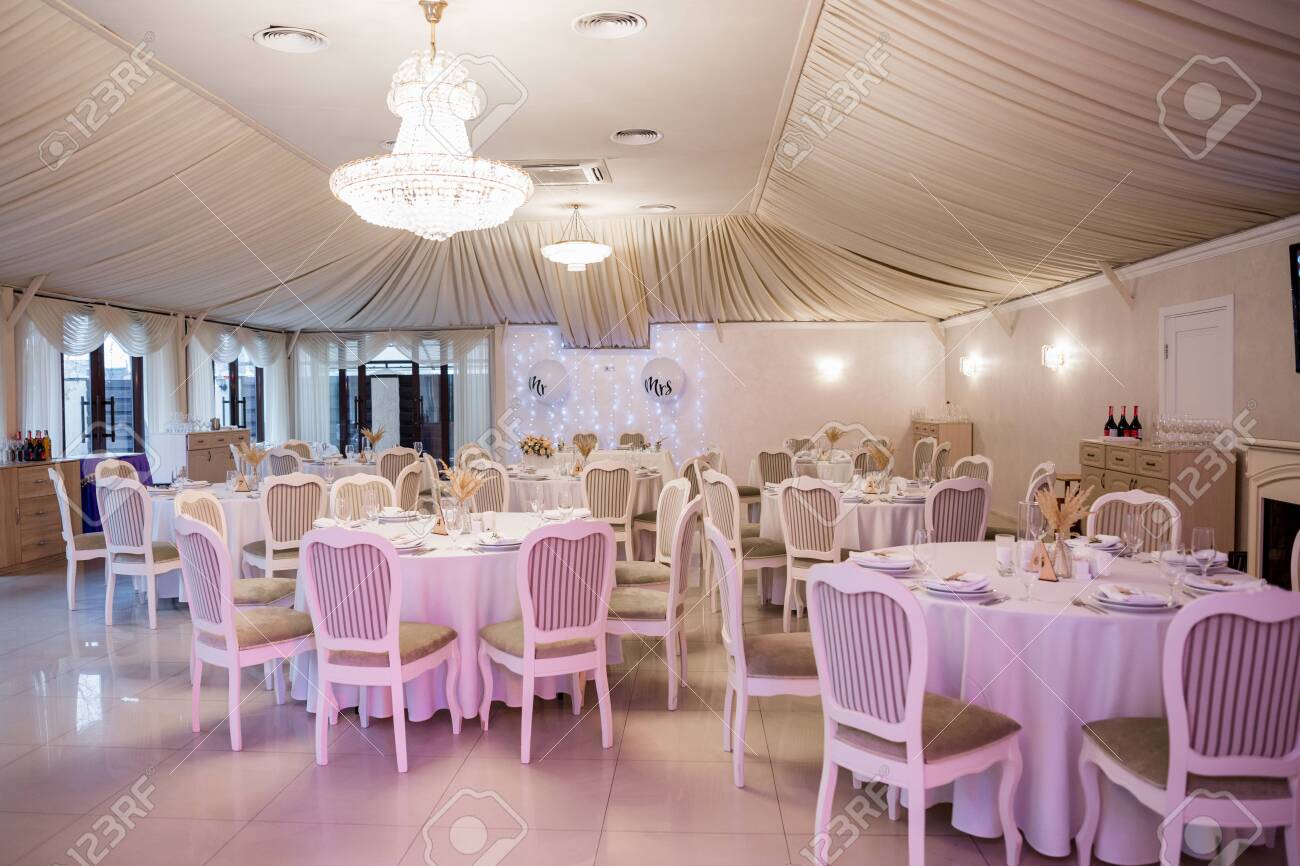 decor of flowers at a wedding in banquet hall - 148429942 decor of flowers at a wedding in banquet hall - 148429942