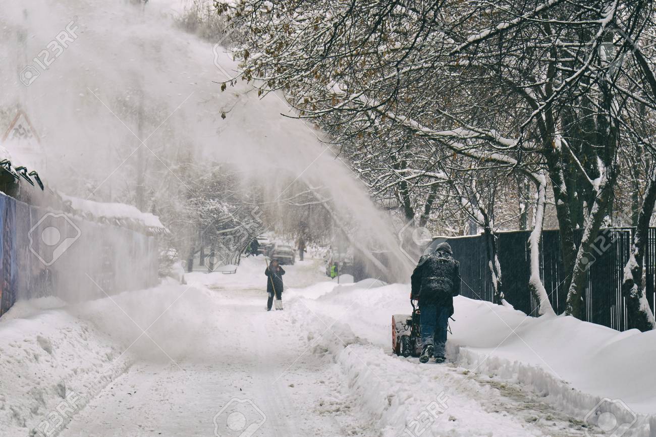 Man Removing Snow From The Moscow Street Using Snow Blower After.. Stock  Photo, Picture And Royalty Free Image. Image 95320835.