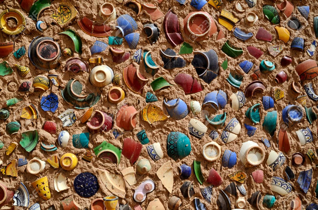 Clay Wall With Background From Broken Moroccan Plates In A Pottery ... Clay Wall With Background From Broken Moroccan Plates In A Pottery ...