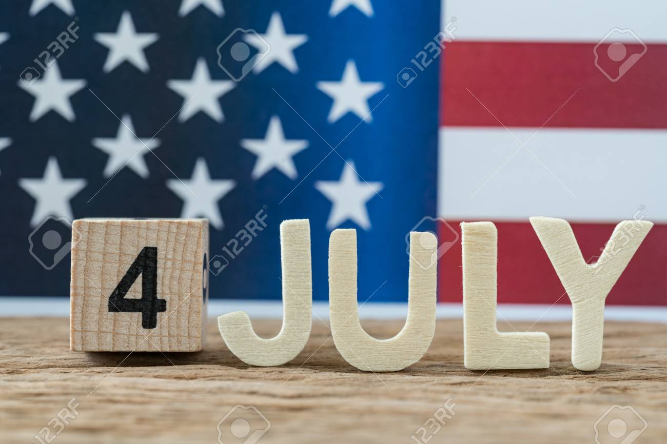 Celebrating The Independence Day With Wooden Block And Alphabet As ...