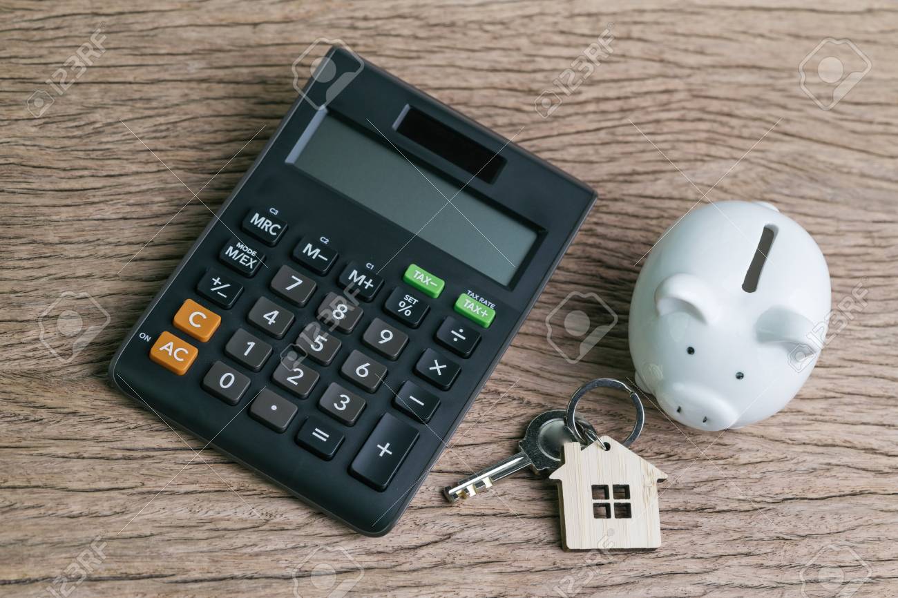 saving money for house or home mortgage and loan calculation concept loan calculator home mortgage