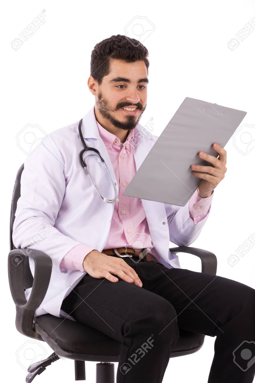 Happy Beard Young Doctor In White Lab Coat With Stethoscope Sitting Stock Photo Picture And Royalty Free Image Image