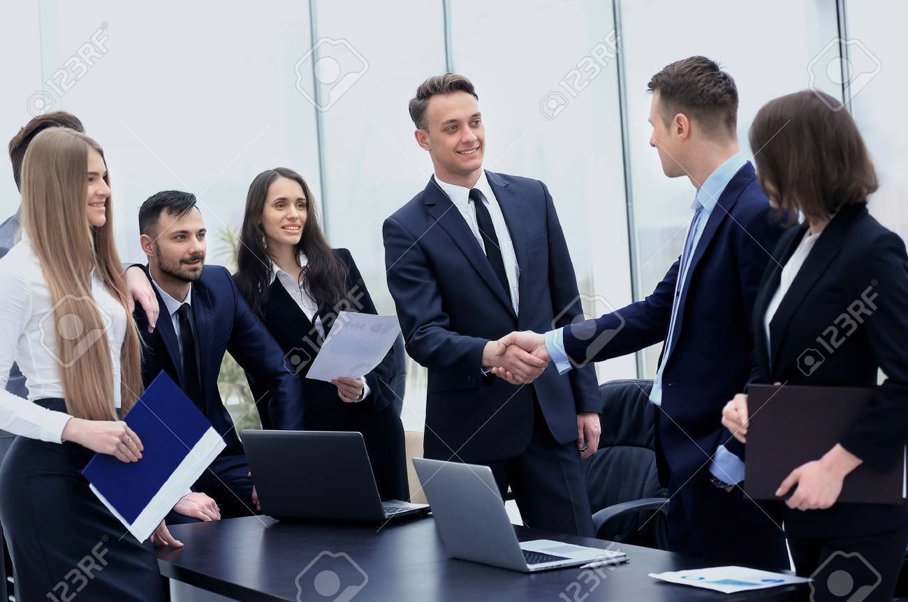 Two Professional Business People Shaking Hands Stock Photo, Picture And  Royalty Free Image. Image 67035806.