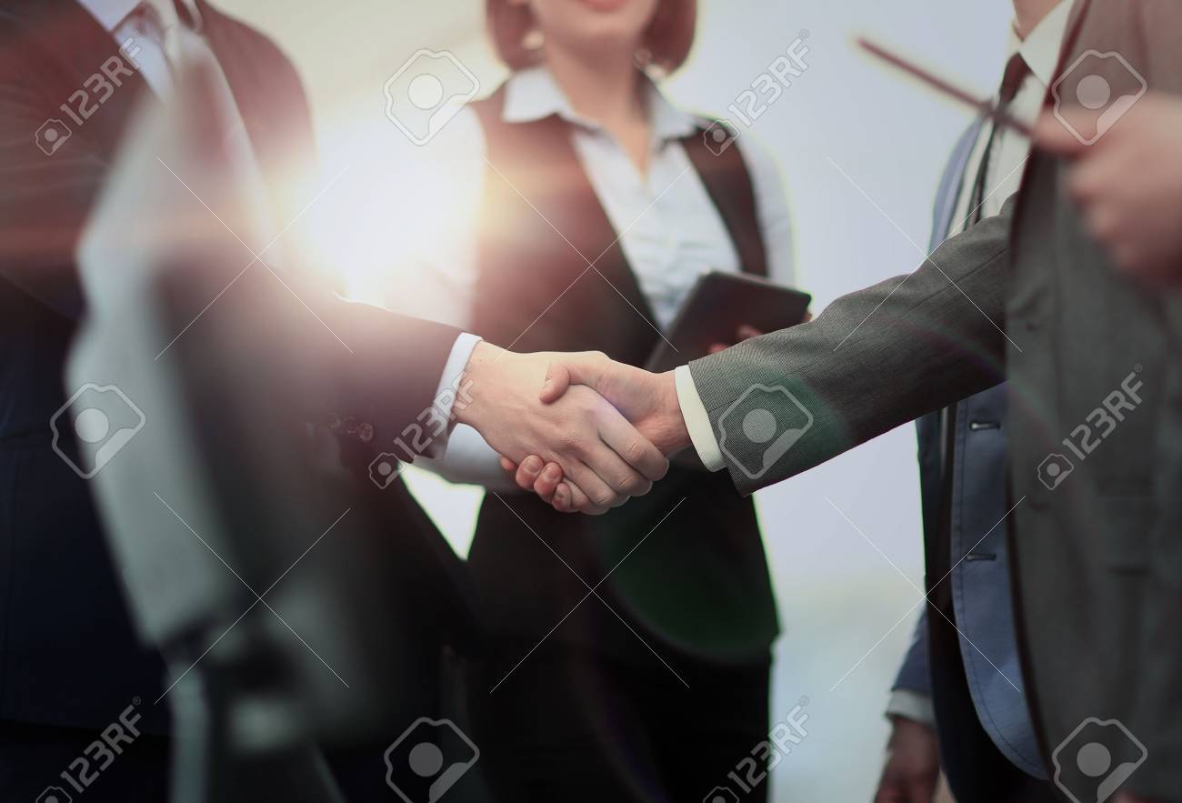 business handshake in modern office - 67468508 business handshake in modern office - 67468508