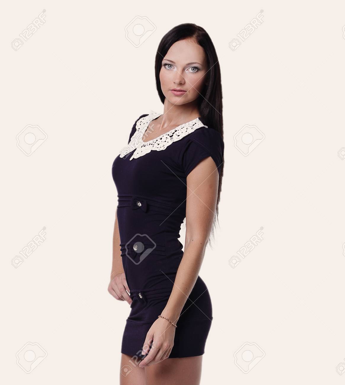 Pretty Tall Woman In Short Black Dress Isolated On White