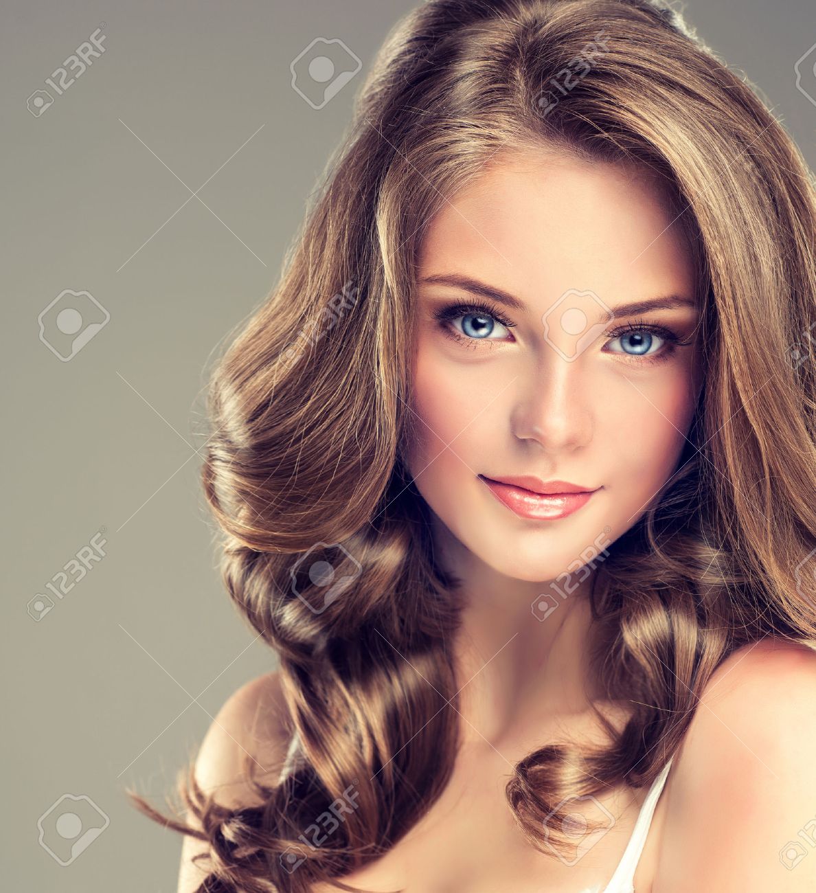 Smiling Beautiful Girl, Brown Hair With An Elegant Hairstyle , Hair Wave ,curly Stock Photo, Picture And Royalty Free Image. Image 38013712. Smiling Beautiful Girl, Brown Hair With An Elegant Hairstyle , Hair Wave ,curly Stock Photo, Picture And Royalty Free Image. Image 38013712.