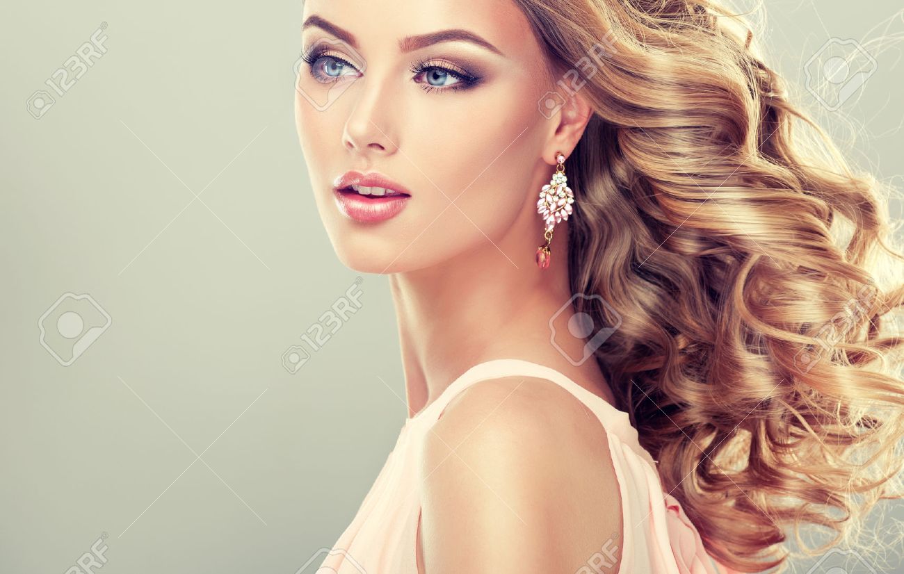 Smiling Beautiful Girl Light Brown Hair With An Elegant Hairstyle