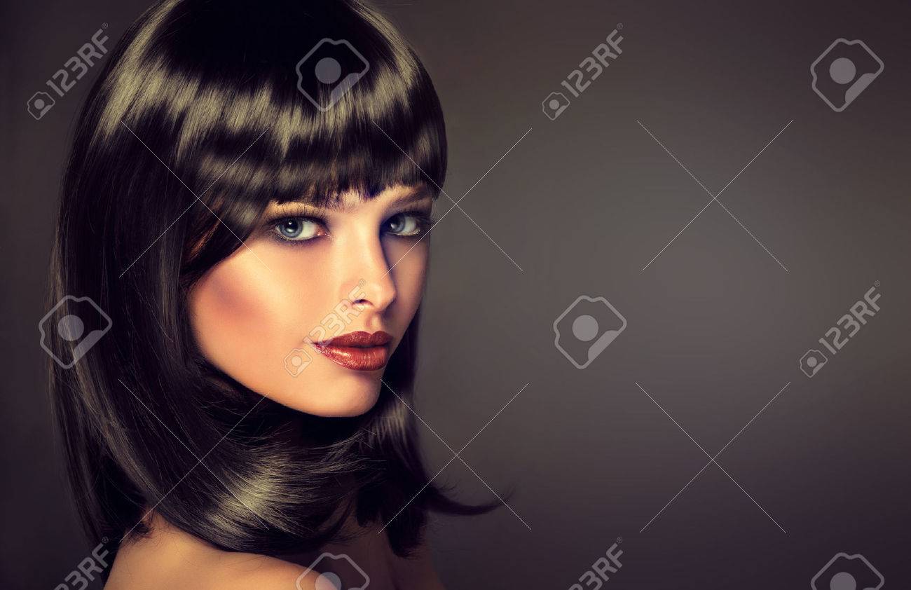The girl in profile with black straight shiny hair and bangs . Model brunette with hairstyle of the care. Luxury fashion style, hair, cosmetics ,make-up - 47684376 The girl in profile with black straight shiny hair and bangs . Model brunette with hairstyle of the care. Luxury fashion style, hair, cosmetics ,make-up - 47684376