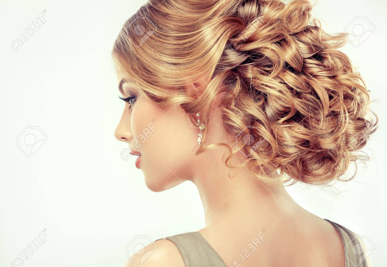 Beautiful girl light brown hair with an elegant hairstyle , hair wave ,curly hairstyle - 47900481 Beautiful girl light brown hair with an elegant hairstyle , hair wave ,curly hairstyle - 47900481