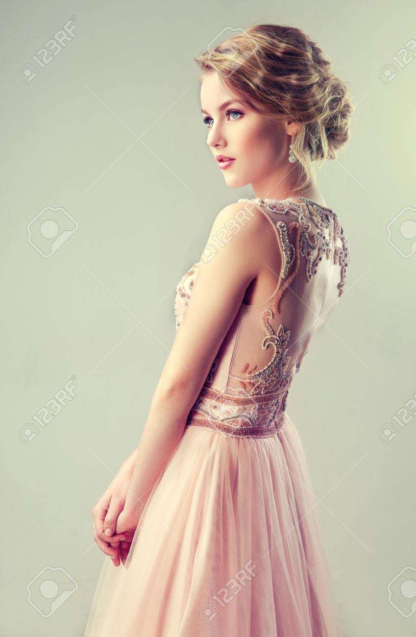 Young Beautiful Woman Dressed In Evening Gown Example Of Wedding