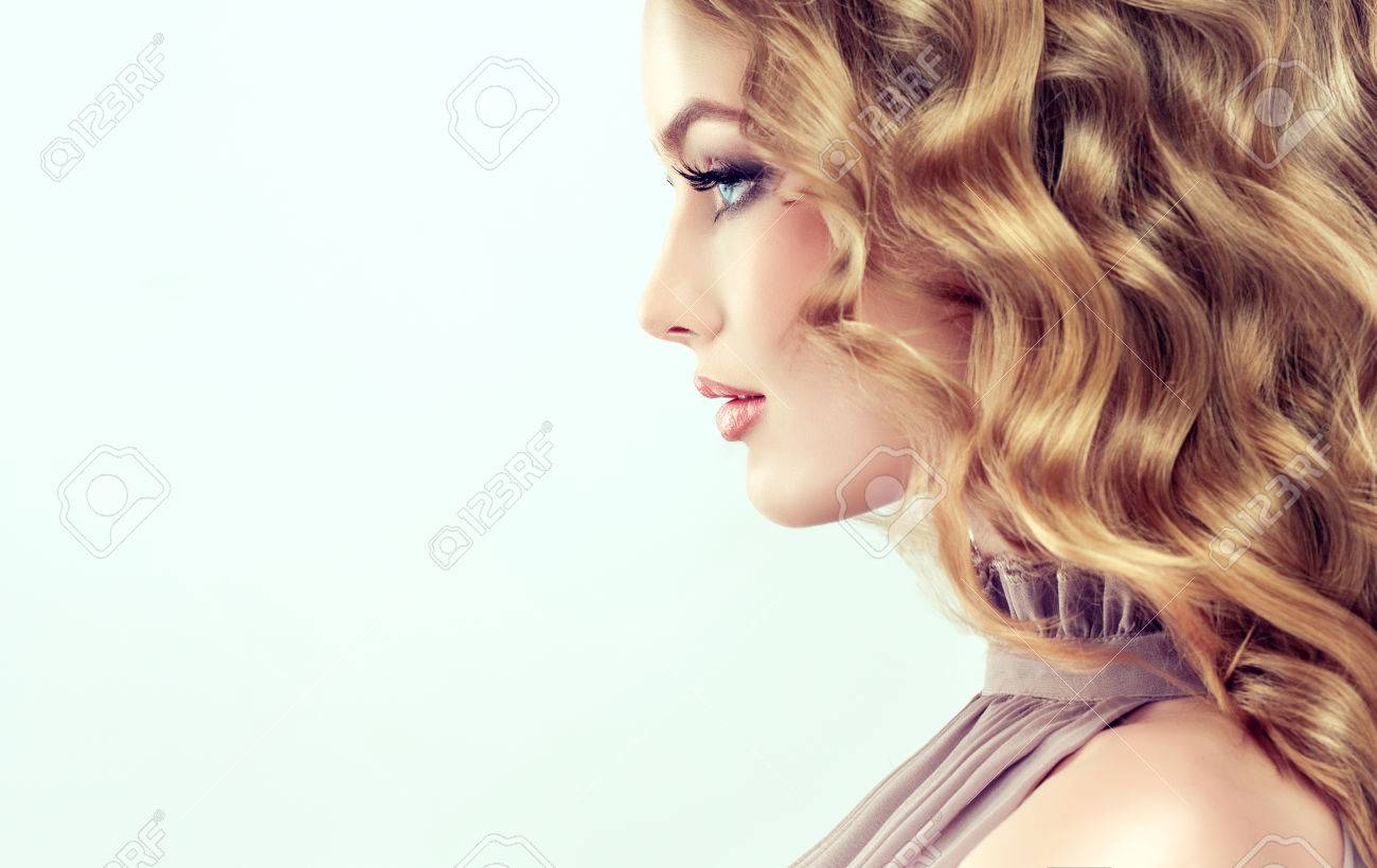 attractive woman blonde with elegant hairstyle example of middle