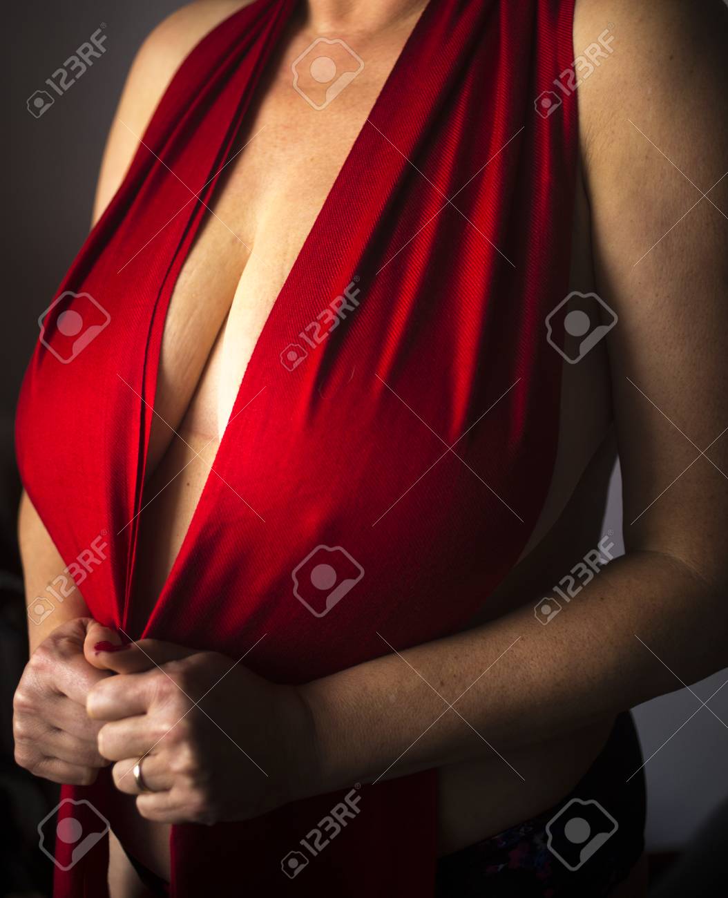 Busty Slim Sexy Lady With Very Big Erotic Breasts And Massive Cleavage  Posing As Adult Model In Photo Shoot. Фотография, картинки, изображения и  сток-фотография без роялти. Image 101335872