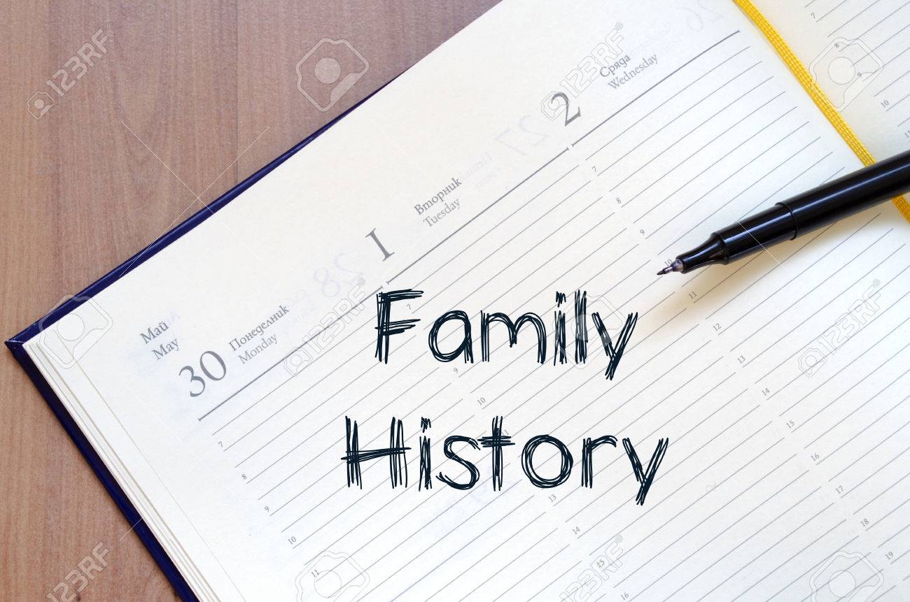 family history text concept write on notebook with pen stock photo