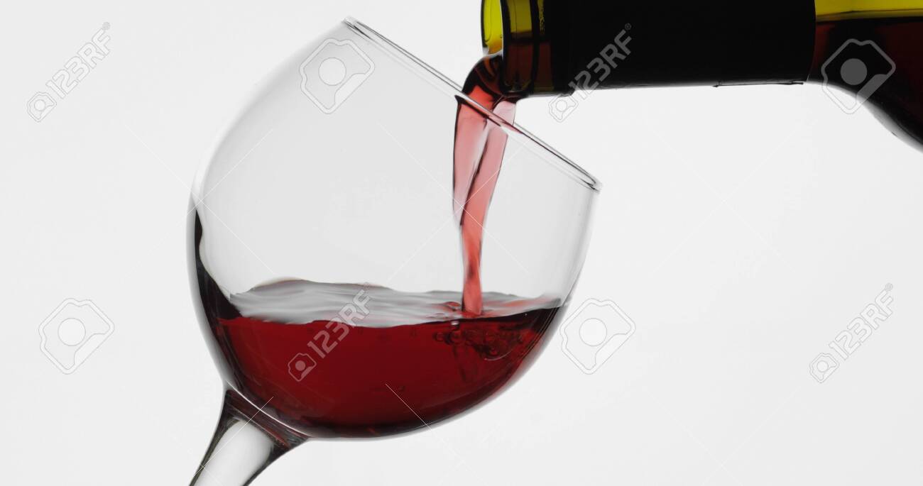 Wine Red Wine Pouring In Wine Glass Over White Background Rose