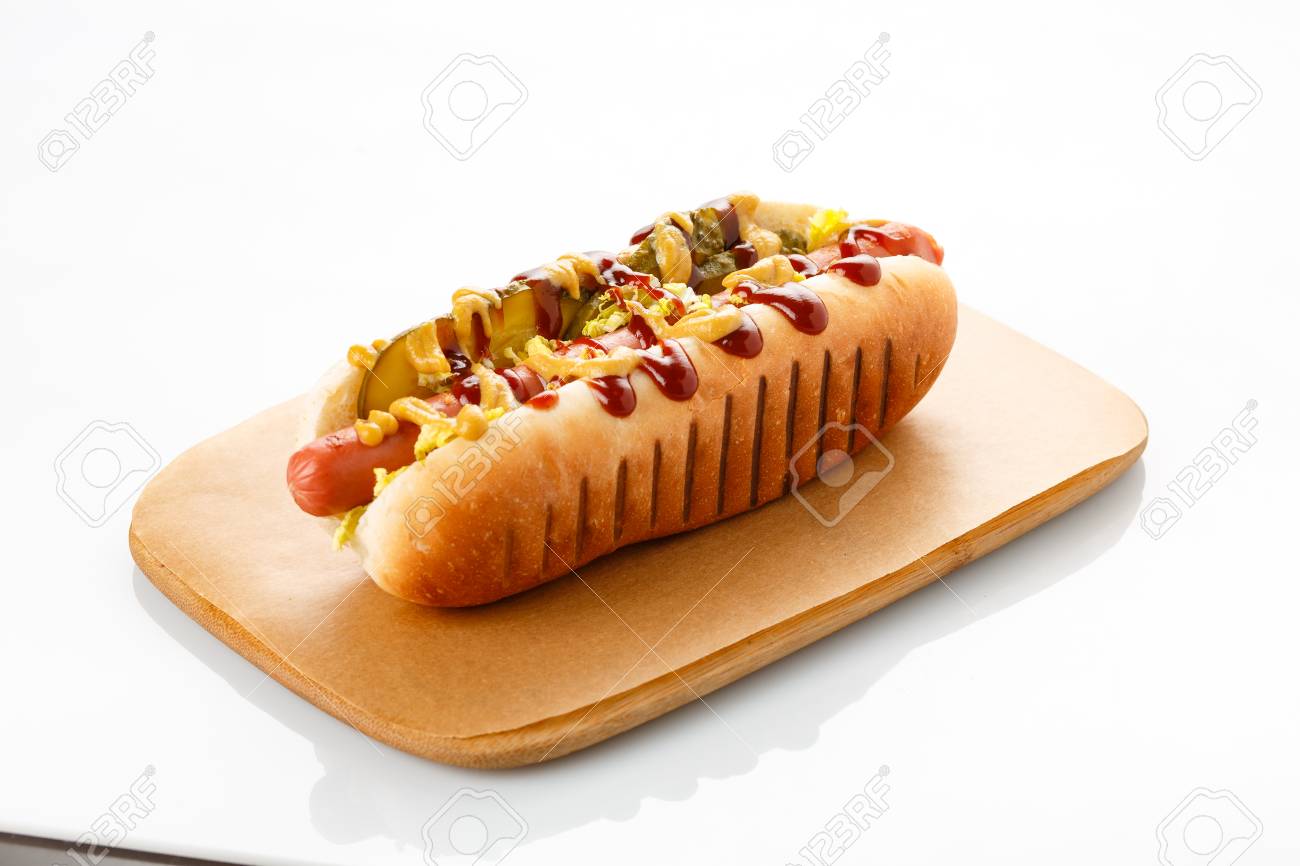 Close Up Of Hot Dog. Fast Food. Isolated Over White Background Stock Photo,  Picture and Royalty Free Image. Image 88999640., image size:1300x866