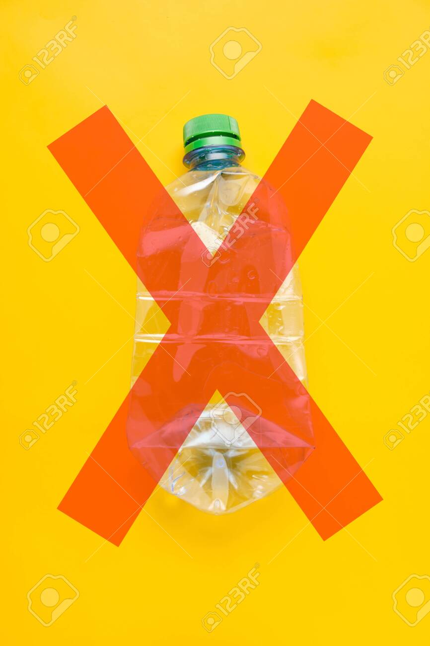 Download Used Plastic Bottle Of Water With Caps X Mark On Yellow Background Stock Photo Picture And Royalty Free Image Image 140042715 PSD Mockup Templates