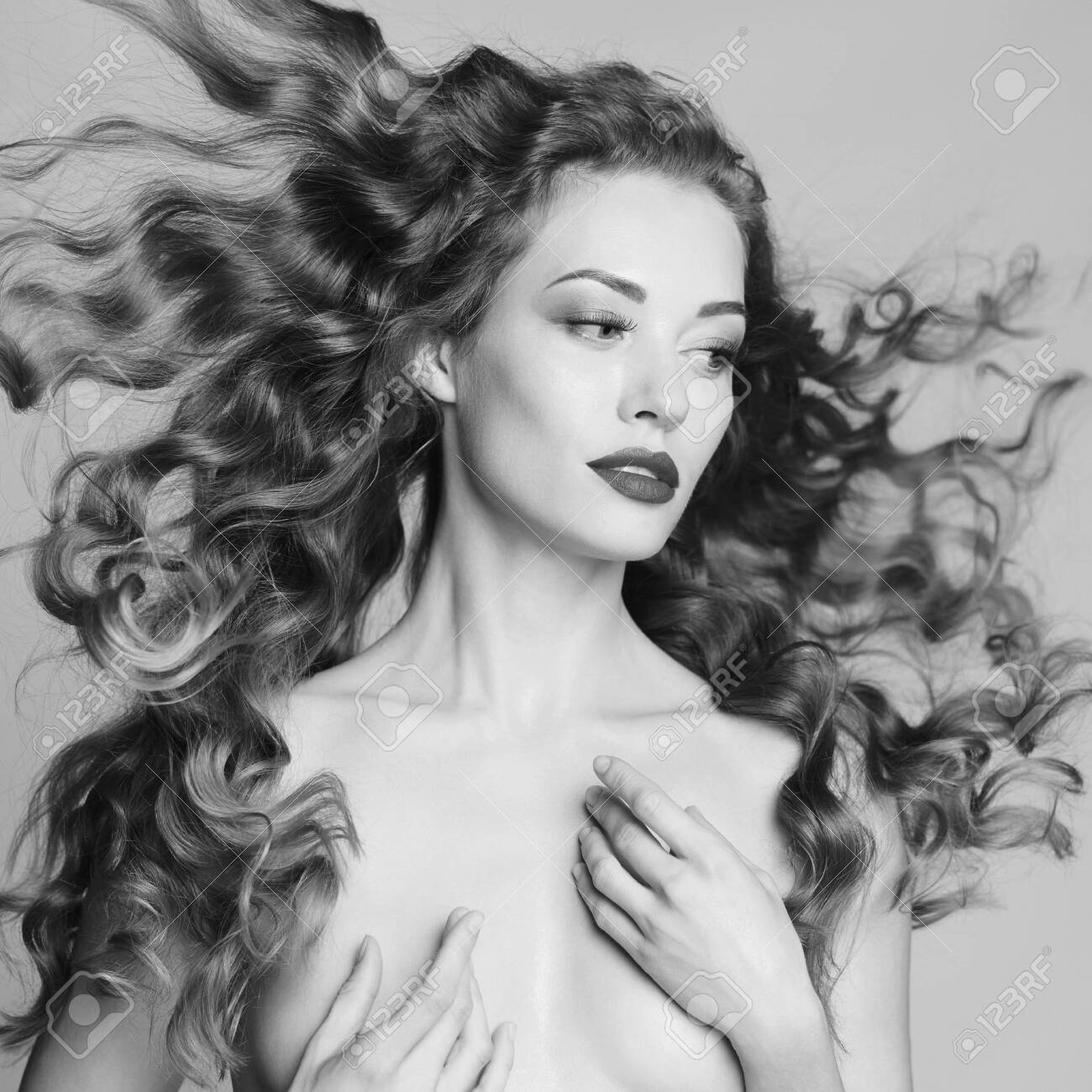 Black And White Art Portrait Of Sensual Nude Woman With Elegant Hairstyle  On Gray Background Stock Photo, Picture and Royalty Free Image. Image  127502878.