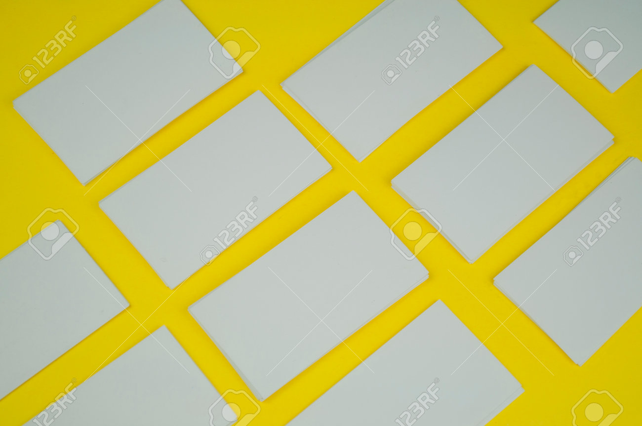 many blank white mokap business cards on a yellow background - 160849409 many blank white mokap business cards on a yellow background - 160849409
