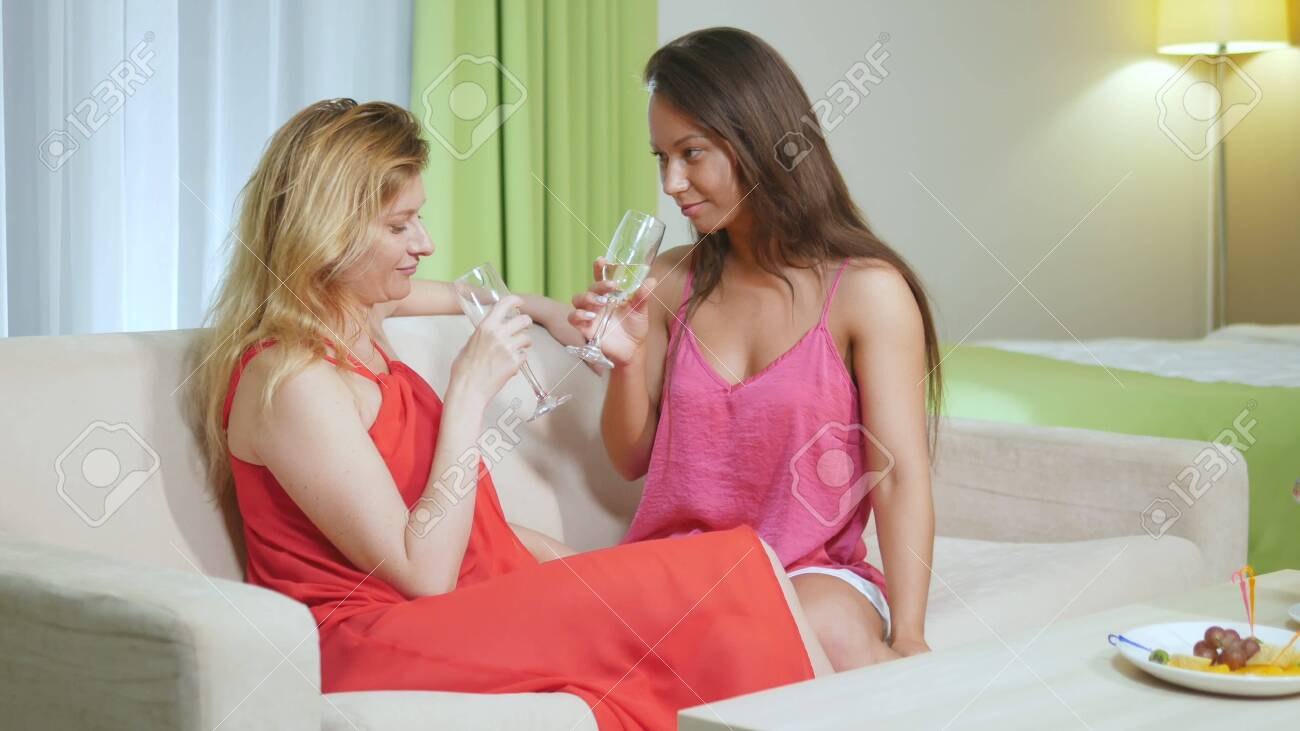 Lesbian Girls Kissing On The Sofa