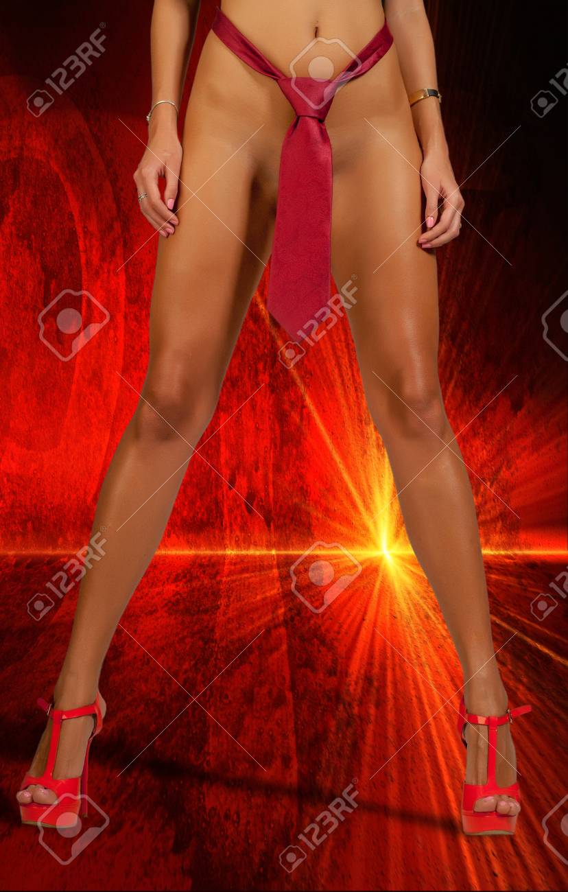 Closeup Of A Naked Female Torso, Her Private Parts Are Not Visible, Woman  Dressed In Man's Tie. Belly Girl. Girl's Legs. Red Shoes. XXX. Perfect Female  Legs Wearing High Heels. Stock Photo,