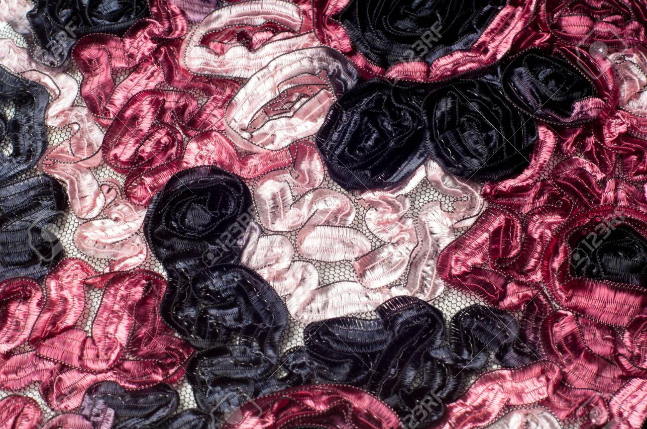 Banque d\u0027images , Motif de fond de texture. Dentelle en tissu, fleurs brodées de tresse, fleurs noires et blanches noires.
