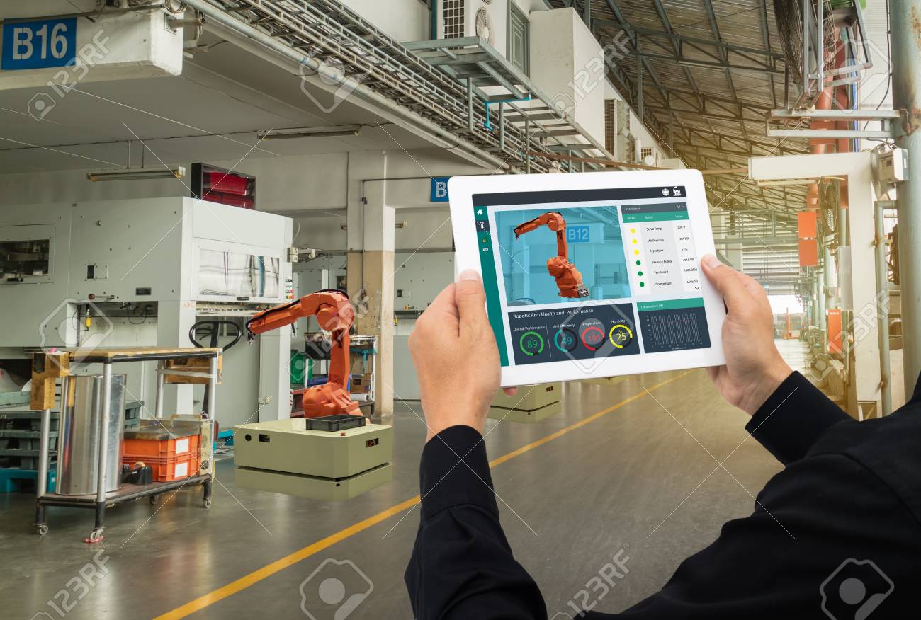 iot industry 4.0 concept,industrial engineer using software (augmented, virtual reality) in tablet to monitoring machine in real time.Smart factory use Automation robot arm in automotive manufacturing - 93708159 iot industry 4.0 concept,industrial engineer using software (augmented, virtual reality) in tablet to monitoring machine in real time.Smart factory use Automation robot arm in automotive manufacturing - 93708159