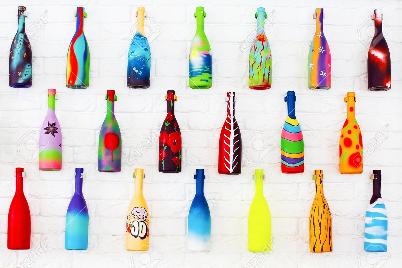 Bright Decorative Bottles Hanging On A White Brick Wall Stock Photo Picture And Royalty Free Image Image 20445822