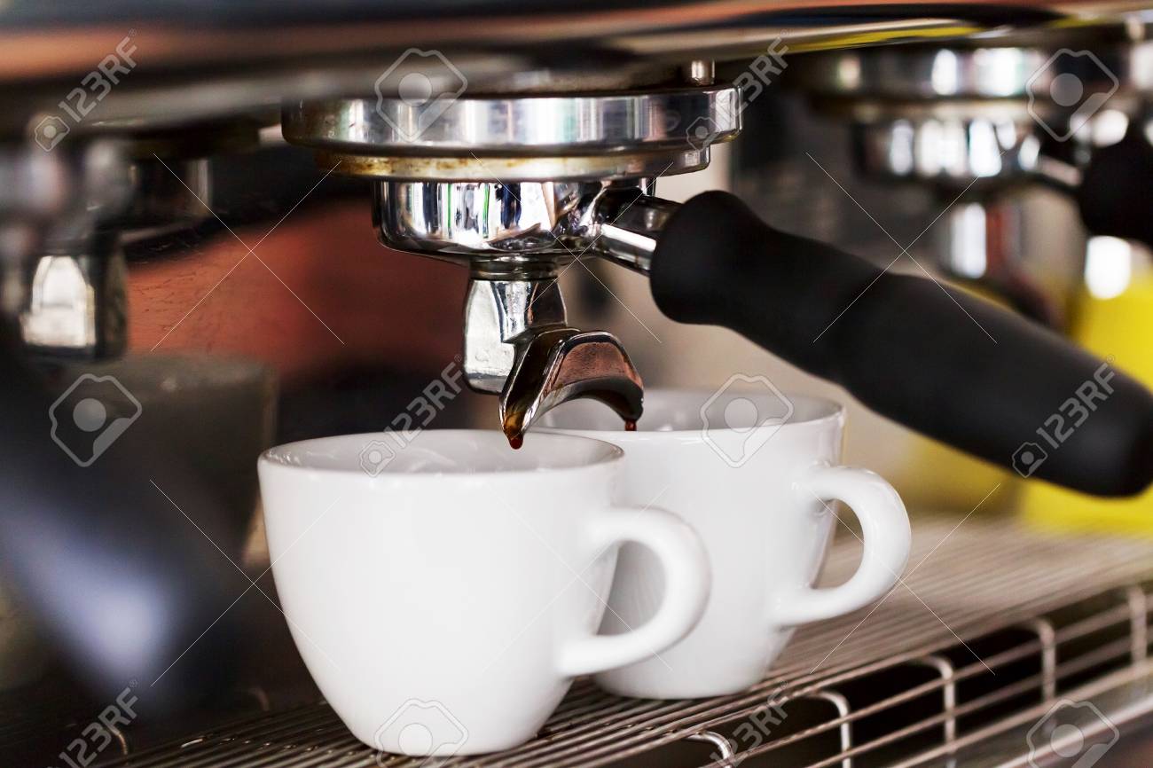 Making Coffee In The Machine Morning Atmospheric Lighting Fashionable Trendy Spot Soft Focus Making Coffee In The Machine Morning Atmospheric Lighting Fashionable Trendy Spot Soft Focus