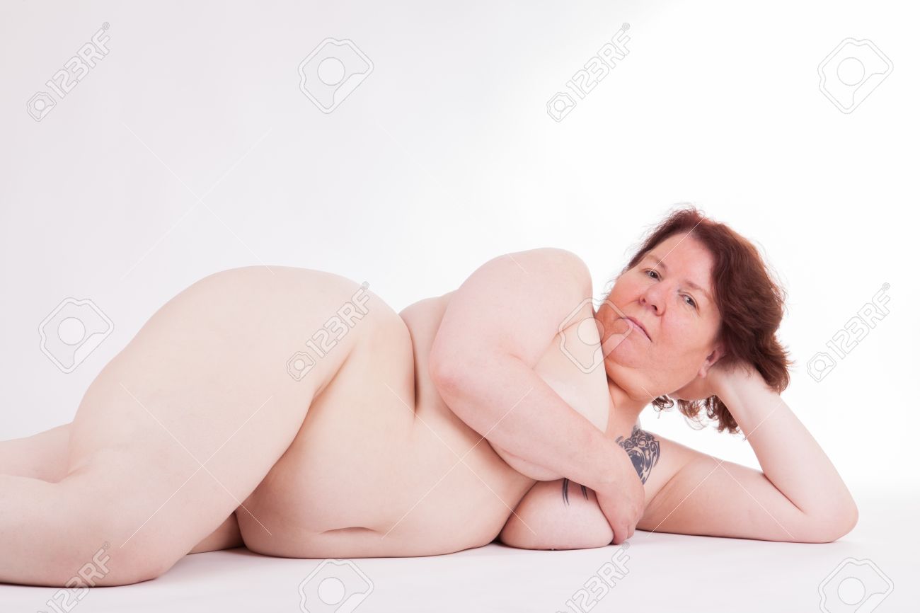 A Fat Nude Woman Is Lying In Front Of The Camera Stock Photo, Picture And Royalty Free Image
