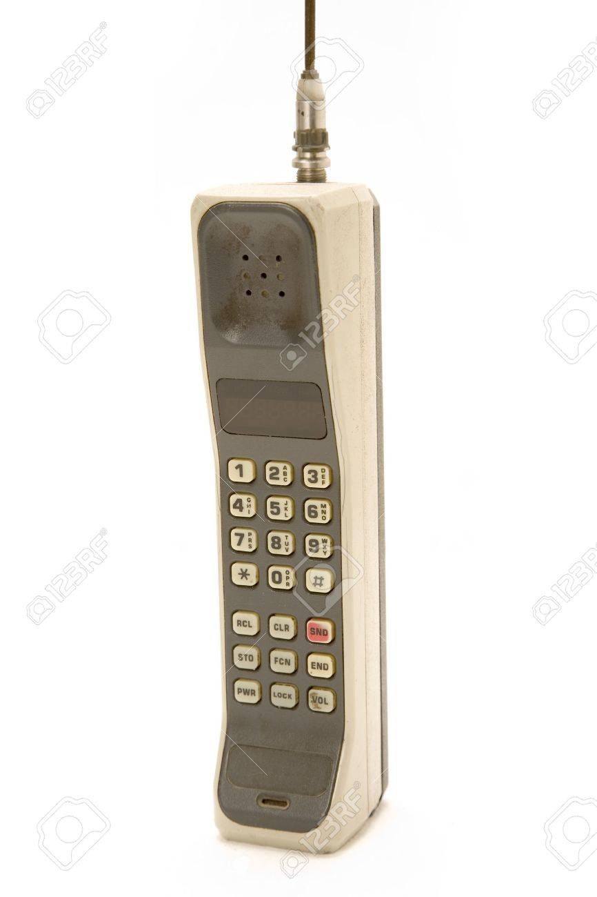 Early 1990s Style Mobile Phone One Of The First Models Ever Made Isolated On Early 1990s Style Mobile Phone One Of The First Models Ever Made Isolated On