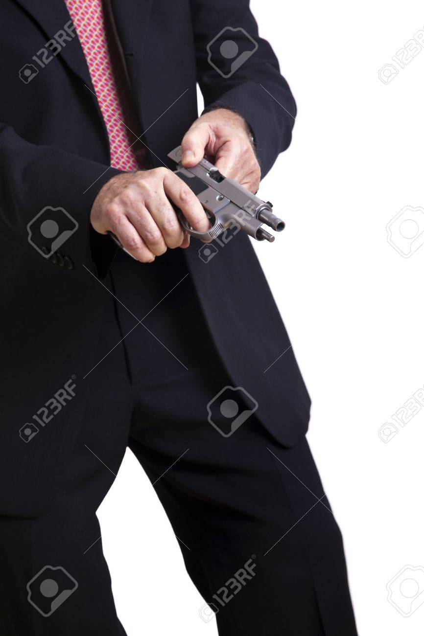 Un Hombre Adulto Maduro Con Un Traje Ladeando Una Pistola 9mm Y Preparandose Para Utilizarlo Aislado Sobre Fondo Blanco Fotos Retratos Imagenes Y Fotografia De Archivo Libres De Derecho Image 18977476 un hombre adulto maduro con un traje ladeando una pistola 9mm y preparandose para utilizarlo aislado sobre fondo blanco