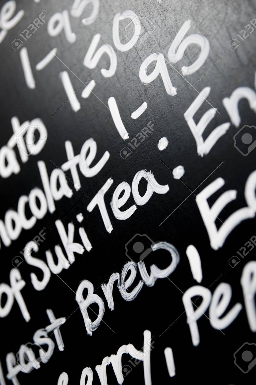 hand written chalk menu board featured the word tea prominently chalk menu board