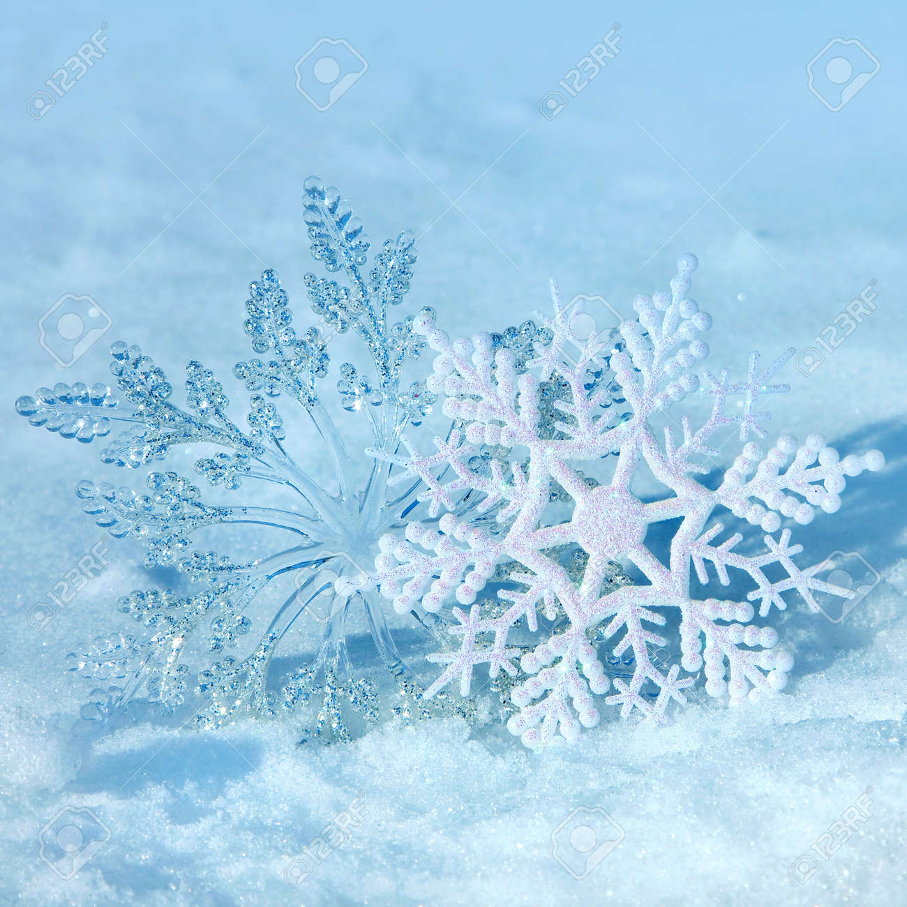 christmas decorations snowflakes on a snow background of nature