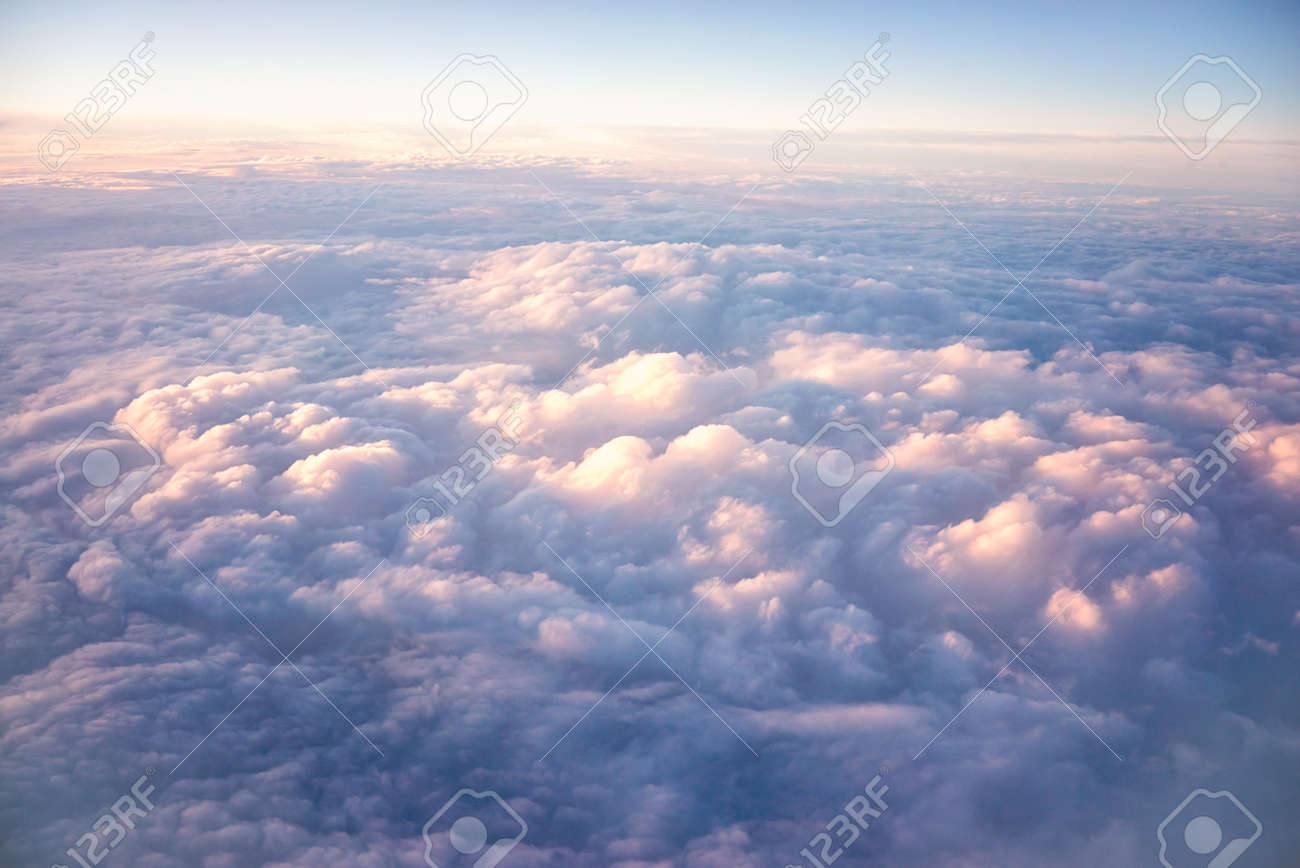 view sky and clouds from an airplane. flying above the clouds. - 122110039 view sky and clouds from an airplane. flying above the clouds. - 122110039