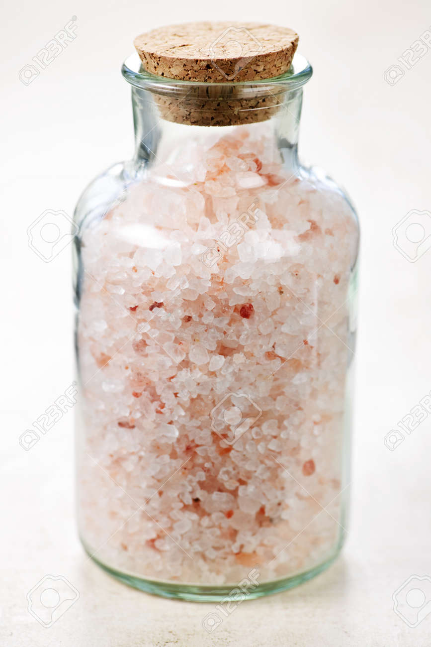 Pink bath salts in a glass jar - 6856901 Pink bath salts in a glass jar - 6856901