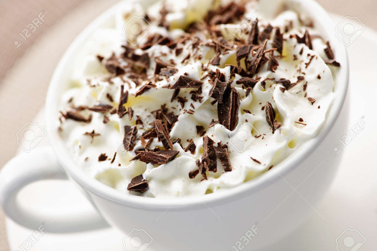 Hot cocoa with shaved chocolate and whipped cream - 7996132 Hot cocoa with shaved chocolate and whipped cream - 7996132