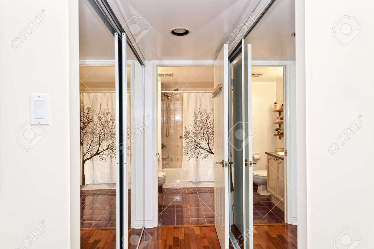 Walk Through Closet To Bathroom interior hallway with walk through mirrored closets to bathroom Walk Through Closet To Bathroom interior hallway with walk through mirrored closets to bathroom