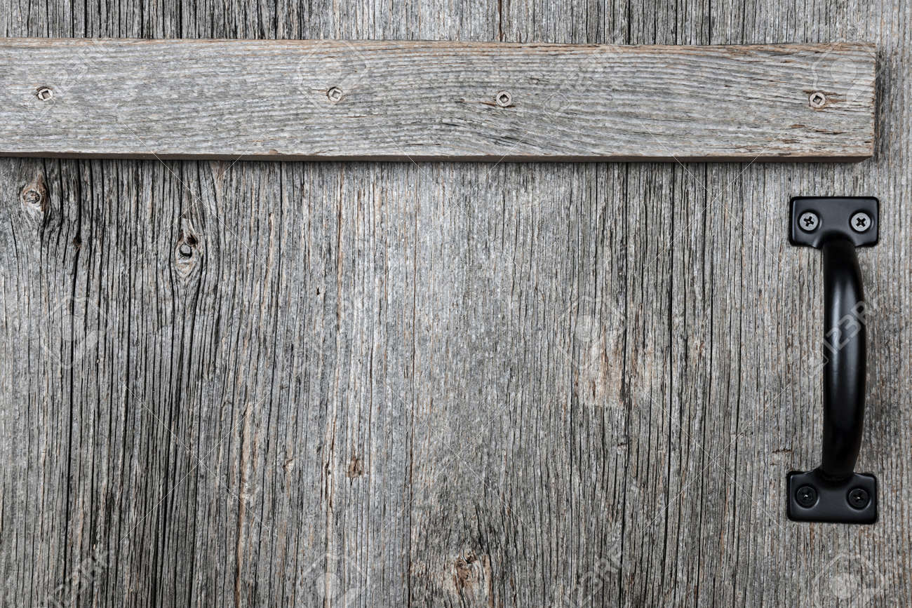 Barn Wood Background distressed rustic barn wood door with handle as textured Barn Wood Background distressed rustic barn wood door with handle as textured