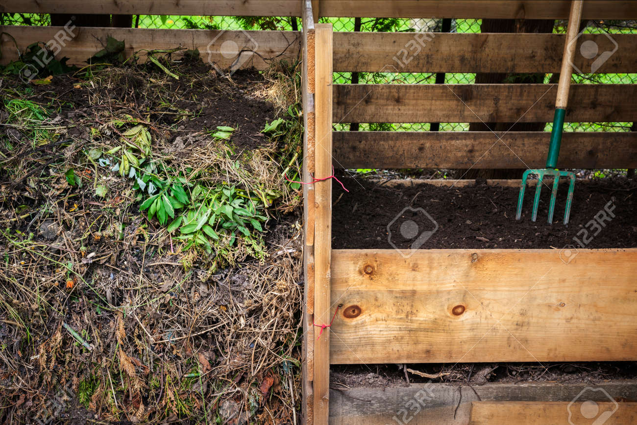 Large cedar wood compost boxes with composted soil and yard waste for backyard composting - 35893308 Large cedar wood compost boxes with composted soil and yard waste for backyard composting - 35893308