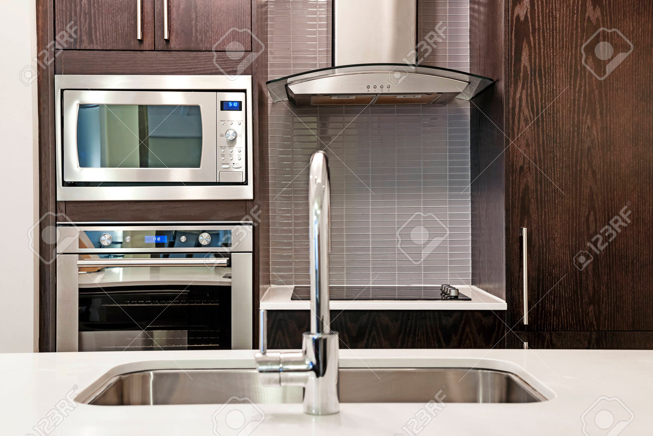 Modern luxury kitchen interior with stone countertop and stainless steel appliances - 39234804 Modern luxury kitchen interior with stone countertop and stainless steel appliances - 39234804